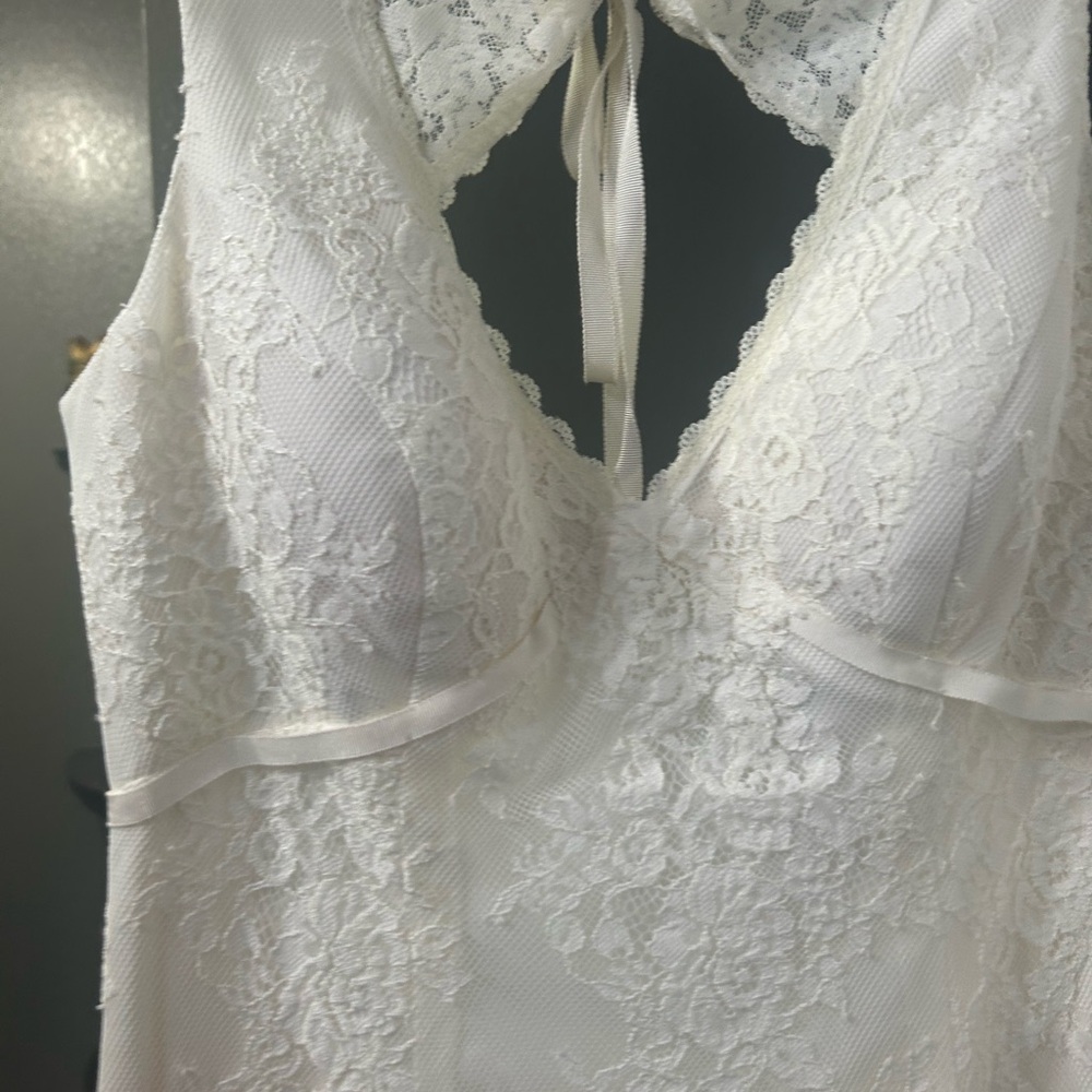 Stunning ivory lace wedding dress.